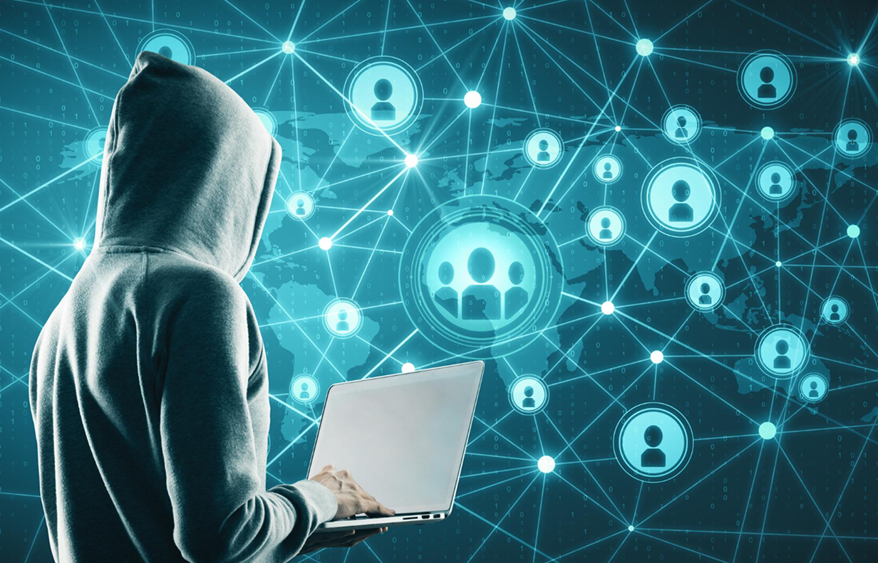 Person using a laptop with a cybersecurity threat network displayed on screen in Melbourne