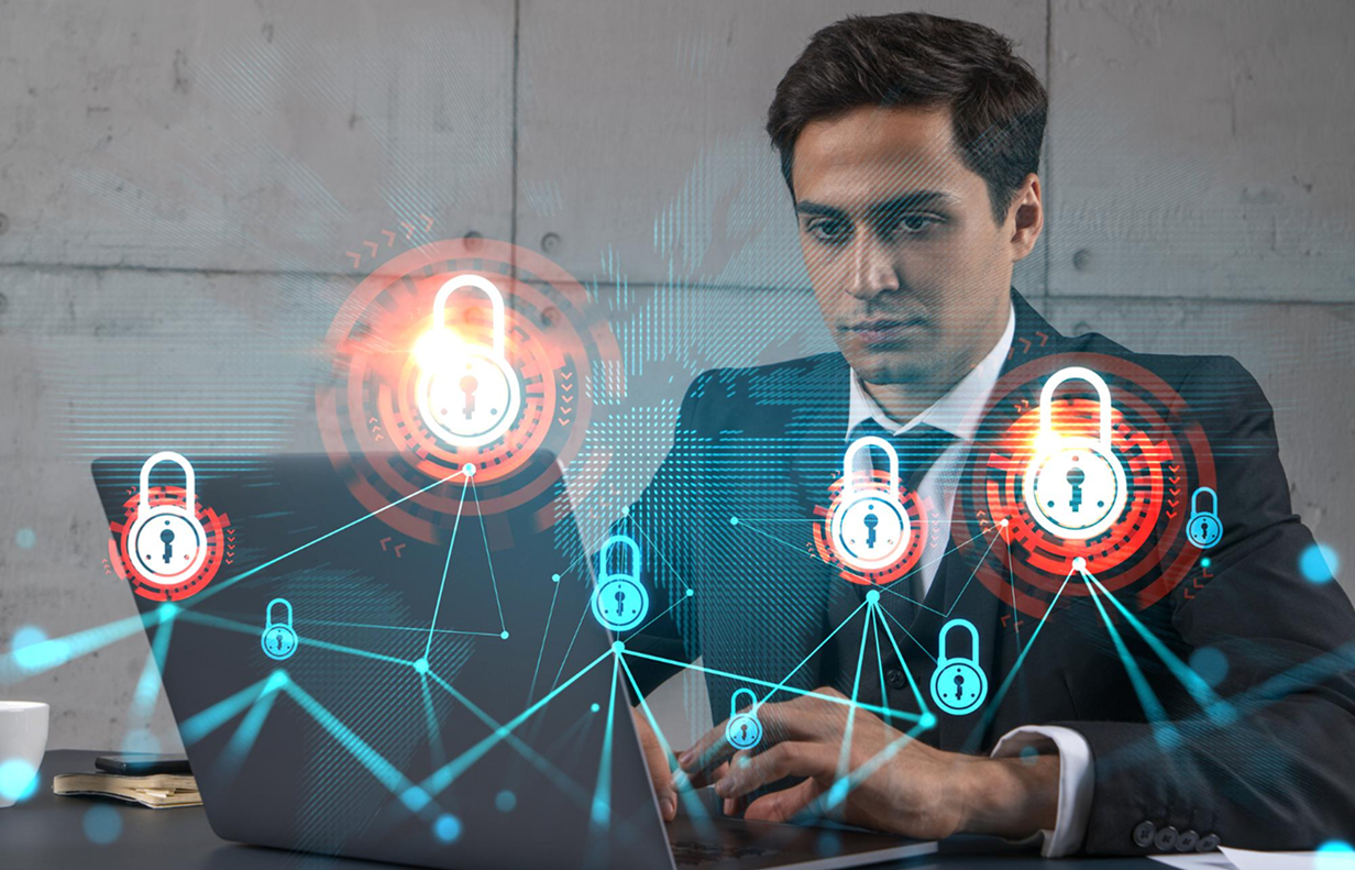 Business professional reviewing user access permissions and cybersecurity controls on a computer in Melbourne